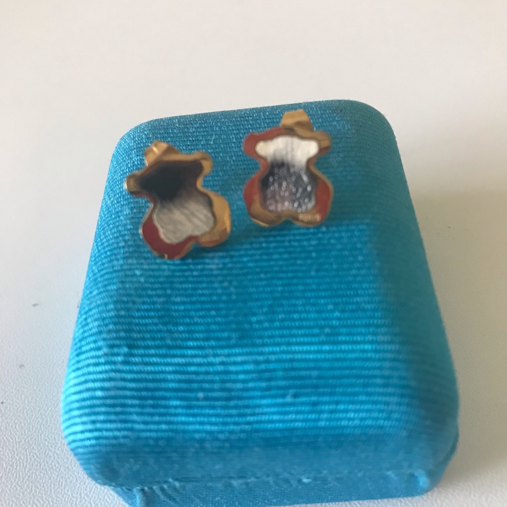 Gold women’s earring